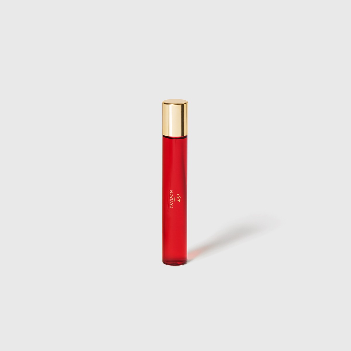 Small red perfume bottle, golden cap