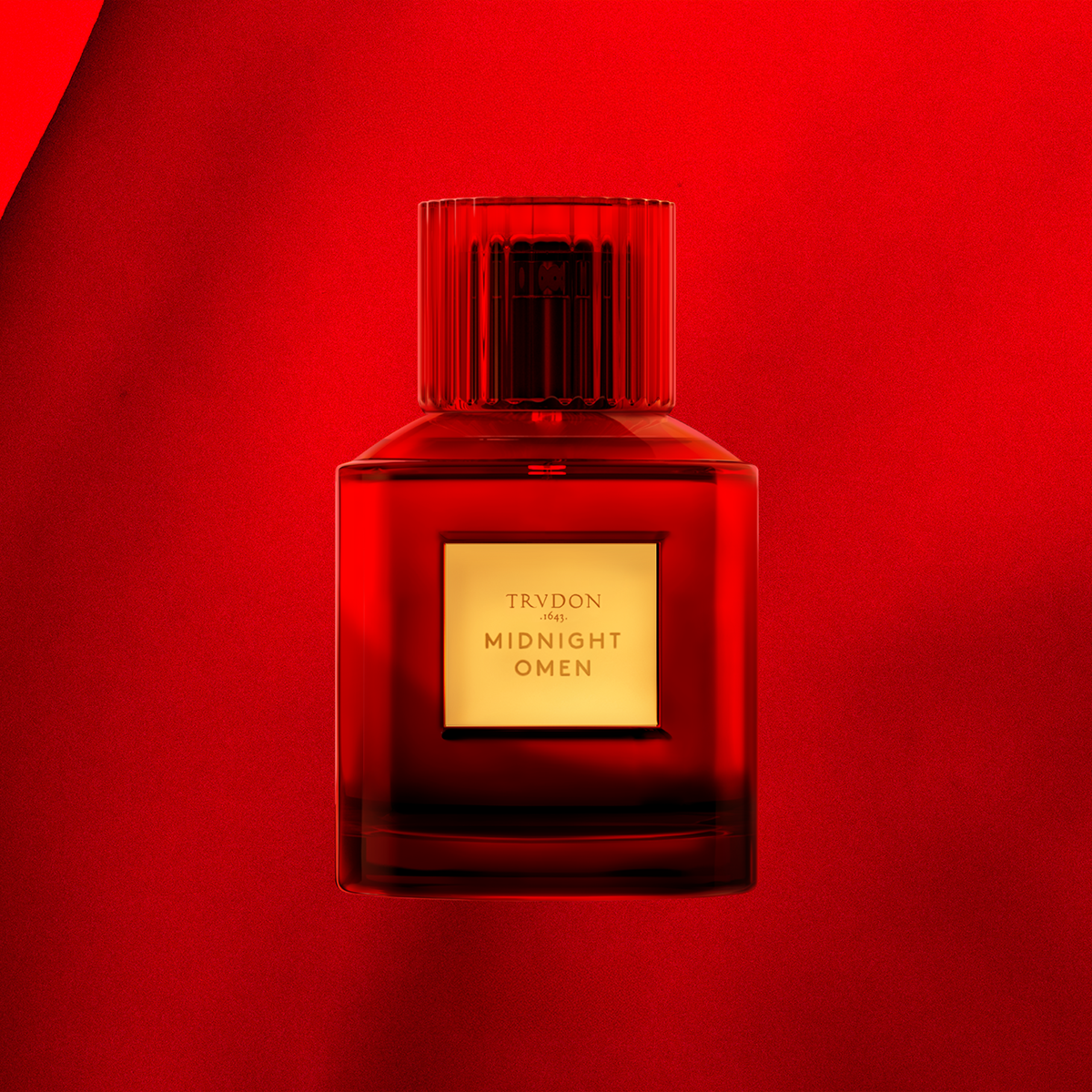 Picture of red Perfume bottle with cashemire wood ambiance in background